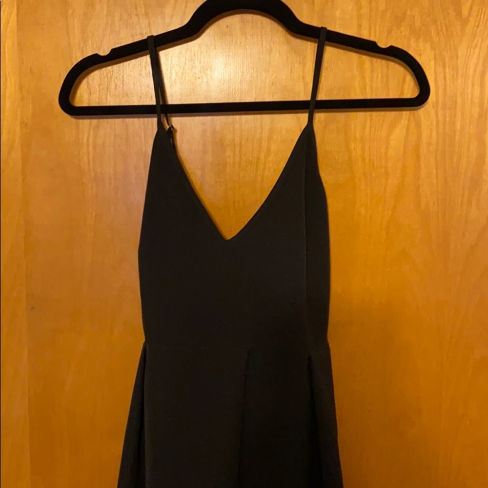 Black empire waist racerback dress with pockets